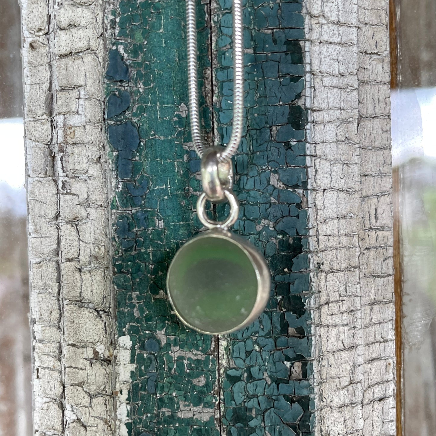 Frosty Clear Marble with a Light Teal Swirl Sea Glass Pendant