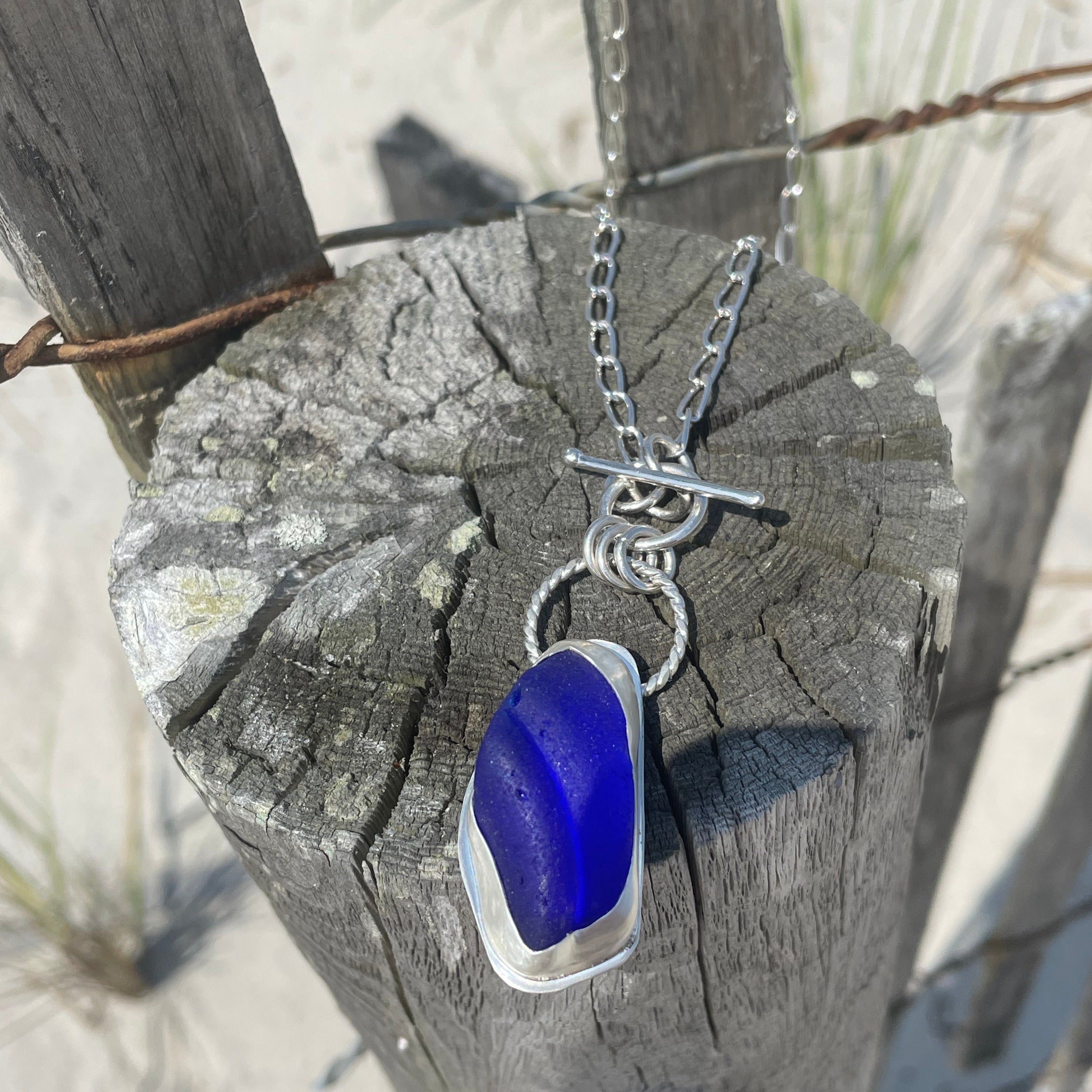 Deep cobalt blue Cornish sea glass pendant set buy into a fine silver bezel setting,blue Cornish sea glass pendant set in silver, something blue